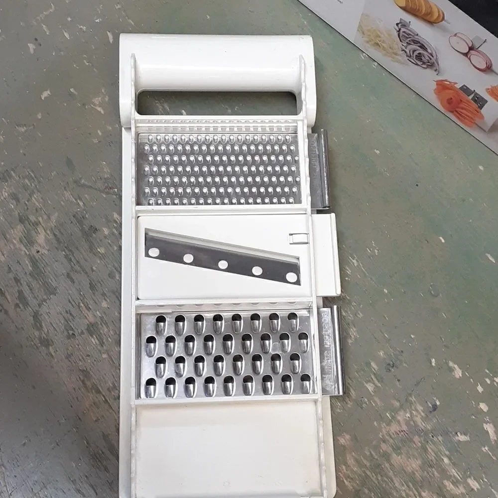 Paterno 7 blade, 8 cut spiraling pro and hand held grater/slicer